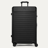 Front view of the Travelpro Platinum Elite Large Check-In Hardside Spinner in Jet Black, featuring a durable polycarbonate shell, aluminum corner armor, and genuine leather trim.