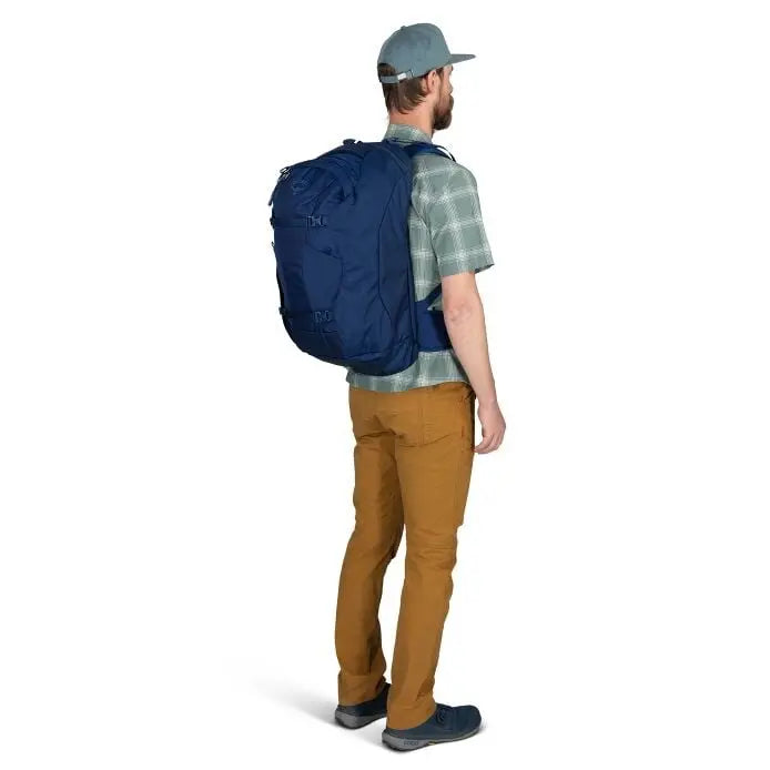 Osprey Farpoint 40 Travel Pack in Antique Blue — on-body side view