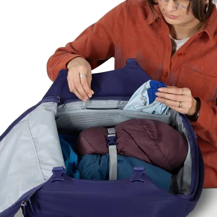 Osprey Sojourn Porter 30L (2026) - interior zippered mesh pocket, shown in Deep Fig