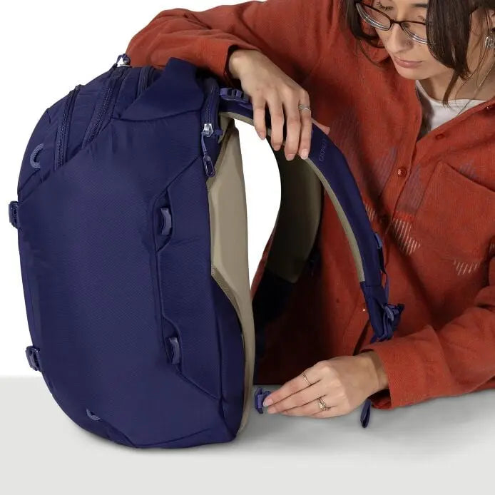 Osprey Sojourn Porter 30L (2026) - stowaway harness access, shown in Deep Fig