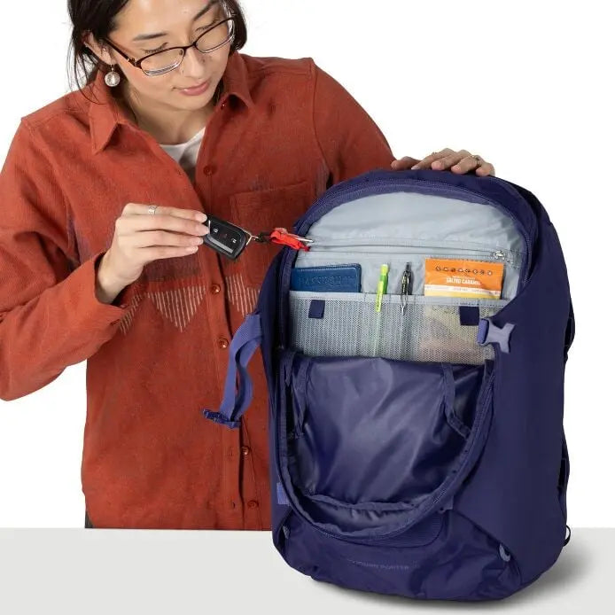 Osprey Sojourn Porter 30L (2026) - zip pocket and key clip, shown in Deep Fig