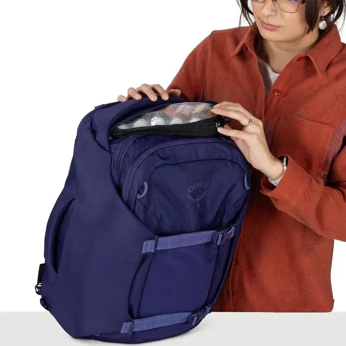 Osprey Sojourn Porter 30L (2026) - quick-draw liquids pocket, shown in Deep Fig