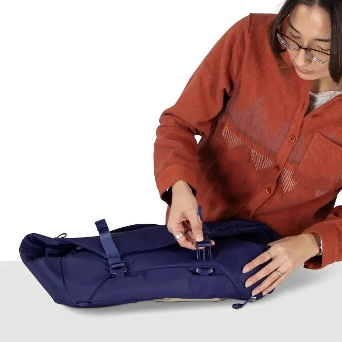 Osprey Sojourn Porter 30L (2026) - flattened pack and carry handle, shown in Deep Fig
