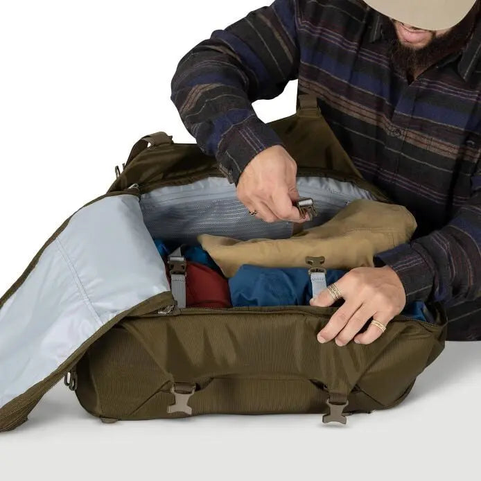 Osprey Sojourn Porter 46L (2026) - internal packing and compression strap, shown in Moss Green