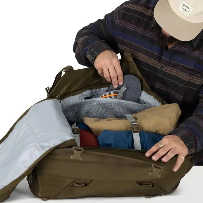 Osprey Sojourn Porter 46L (2026) - interior zippered mesh pocket, shown in Moss Green