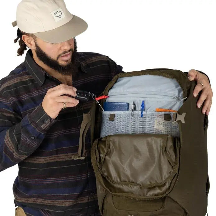 Osprey Sojourn Porter 46L (2026) - zip pocket and key clip, shown in Moss Green
