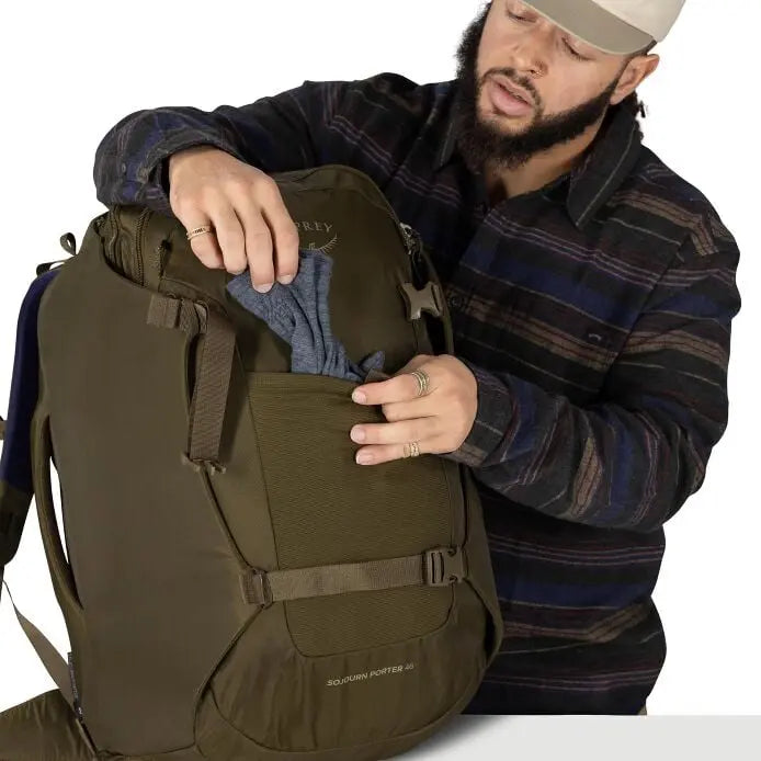 Osprey Sojourn Porter 46L (2026) - front shove-it pocket, shown in Moss Green