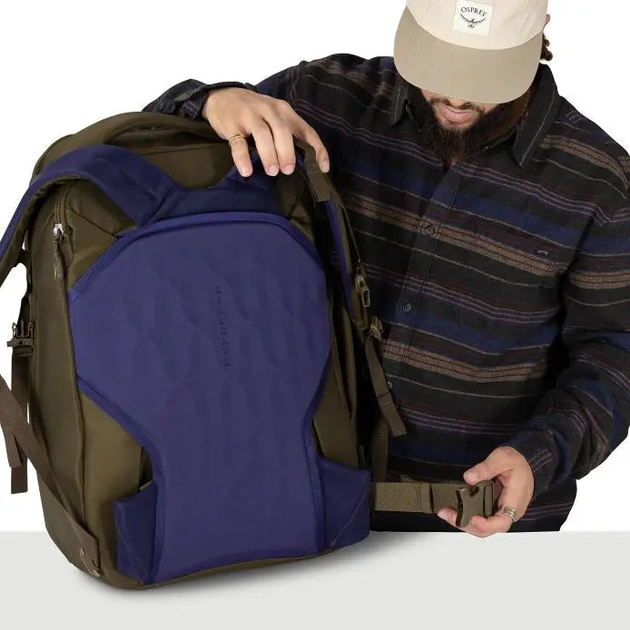 Osprey Sojourn Porter 46L (2026) - stowaway harness demonstration, shown in Moss Green