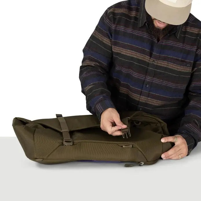 Osprey Sojourn Porter 46L (2026) - side carry handle, shown in Moss Green