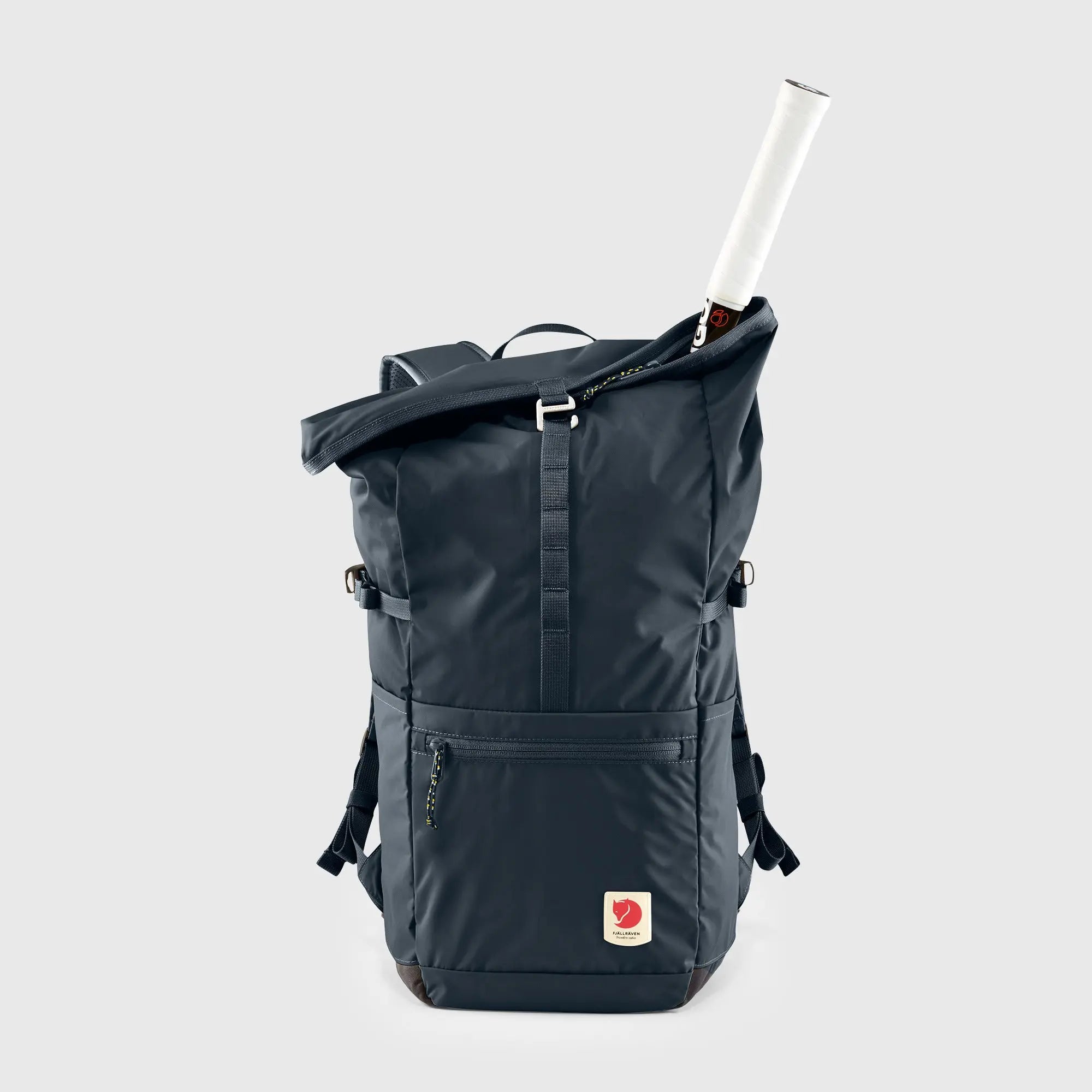Fjallraven High Coast Foldsack 24, side pocket holding a bottle, shown in Navy; shared feature image