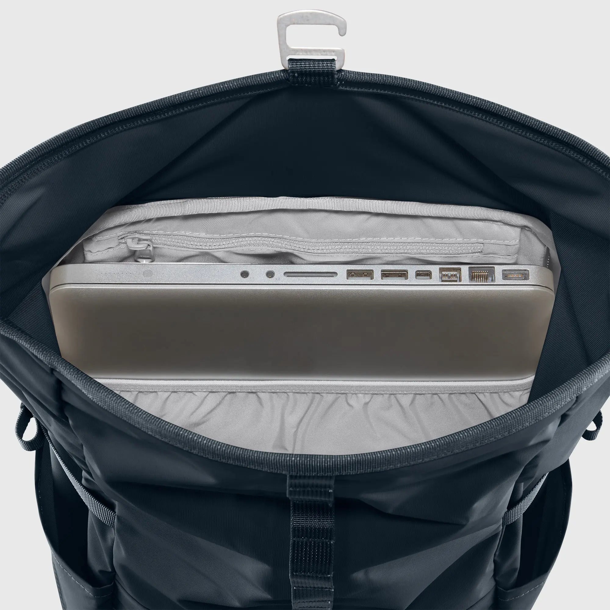 Fjallraven High Coast Foldsack 24, interior sleeve holding a laptop, shown in Navy; shared feature image