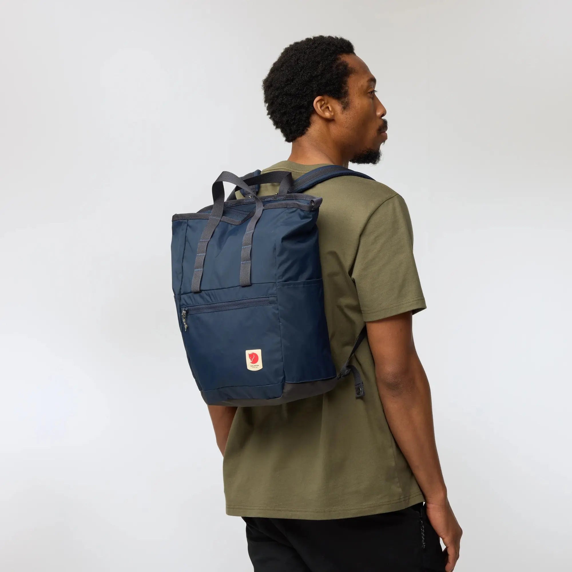 Fjallraven High Coast Totepack, backpack fit viewed at an angle, shown in Navy; shared feature image