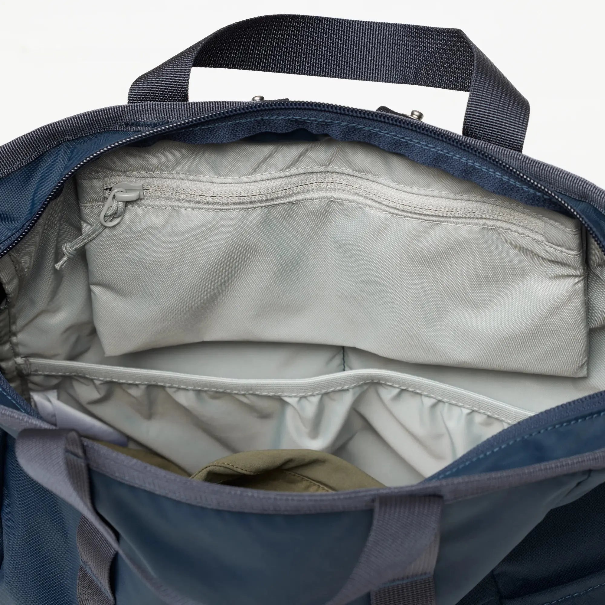 Fjallraven High Coast Totepack, interior zip pocket and organizer, shown in Navy; shared feature image