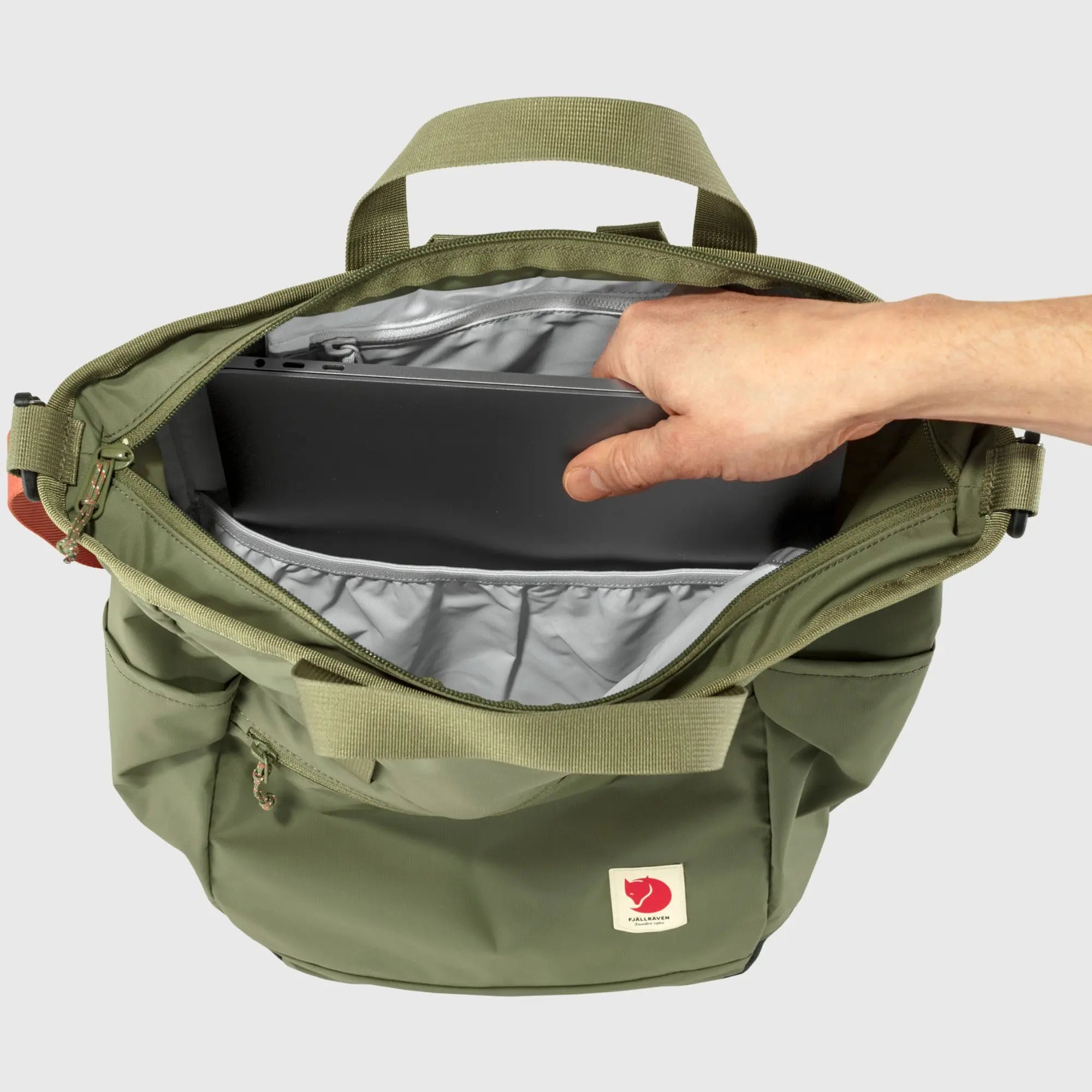 Fjallraven High Coast Totepack, interior sleeve holding a laptop, shown in Green; shared feature image