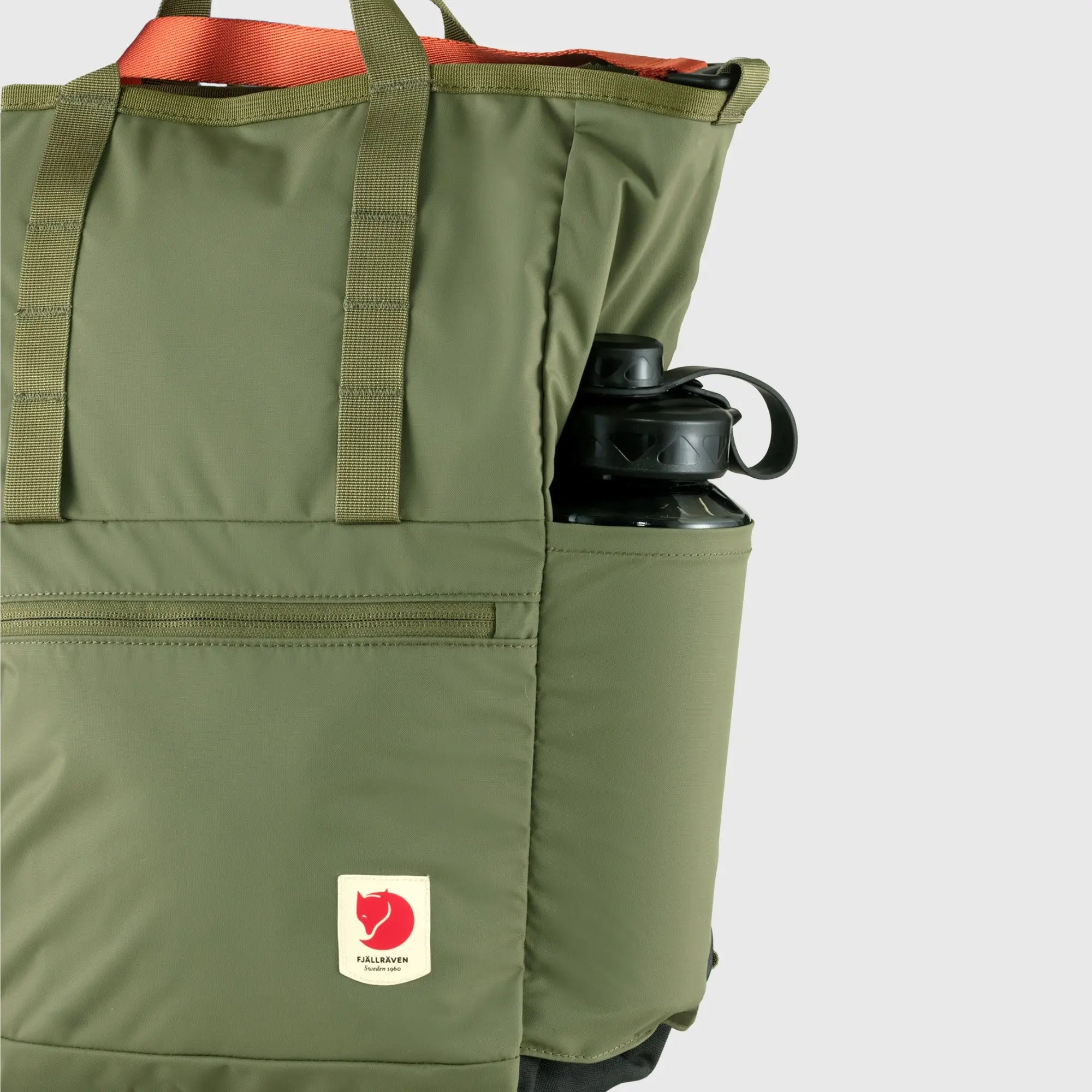 Fjallraven High Coast Totepack, side pocket holding a water bottle, shown in Green; shared feature image