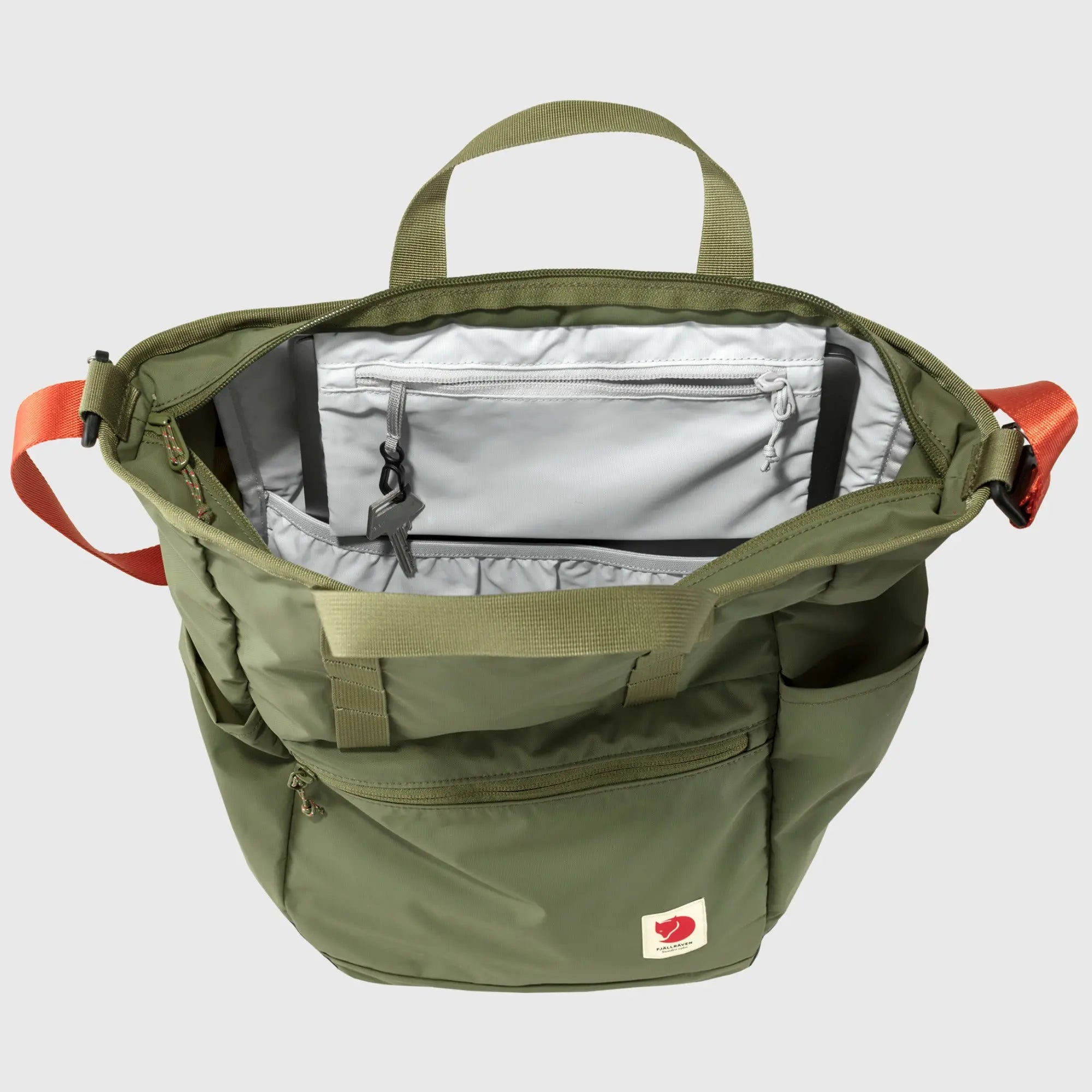 Fjallraven High Coast Totepack, open main compartment and interior zip pocket, shown in Green; shared feature image