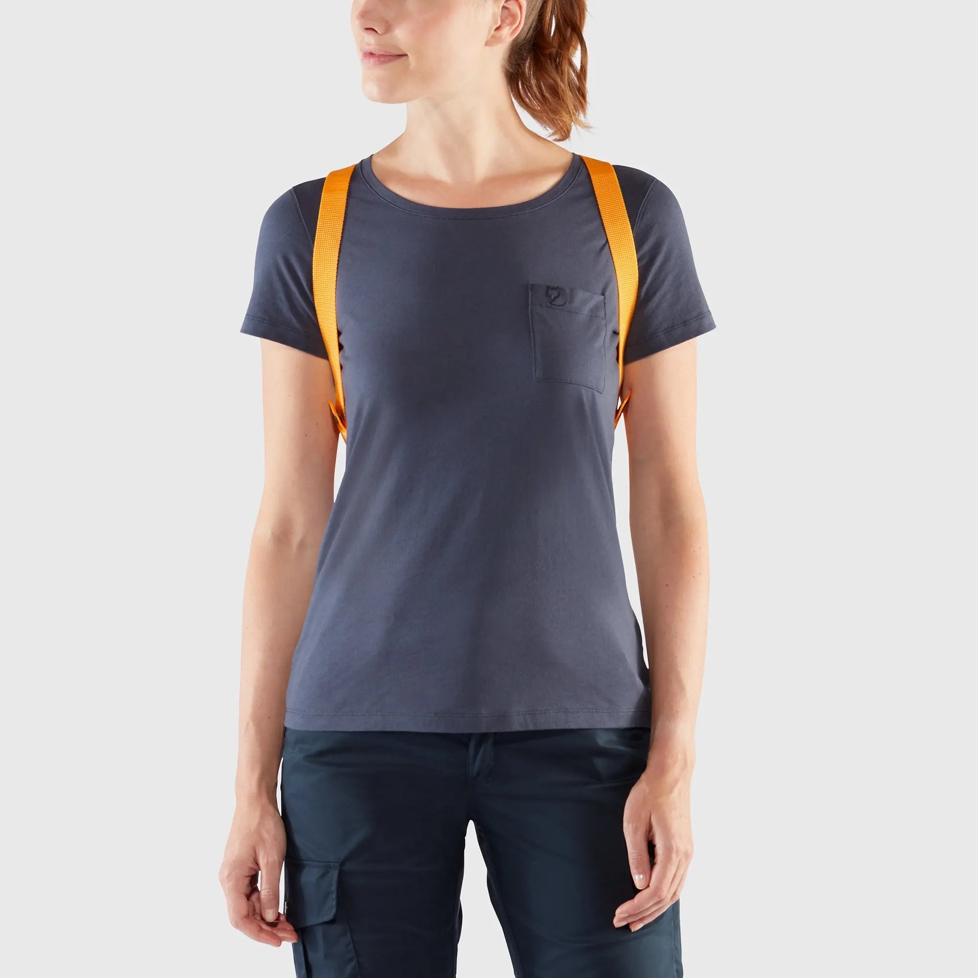 Fjallraven Kanken Mini Backpack, front shoulder-strap fit on a model, shown in Warm Yellow; shared feature image