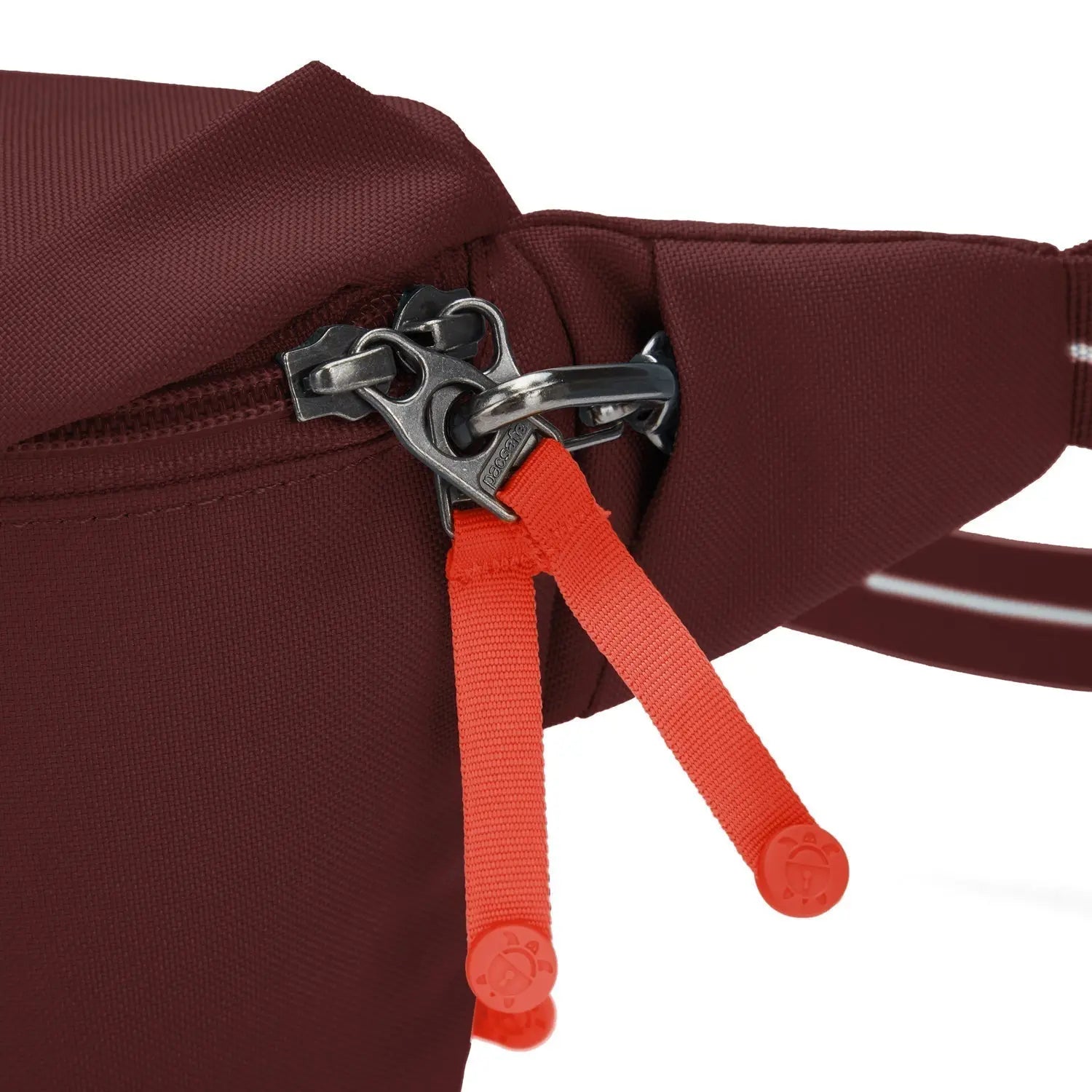 Pacsafe GO Sling Pack, Garnet Red — zip clip security detail