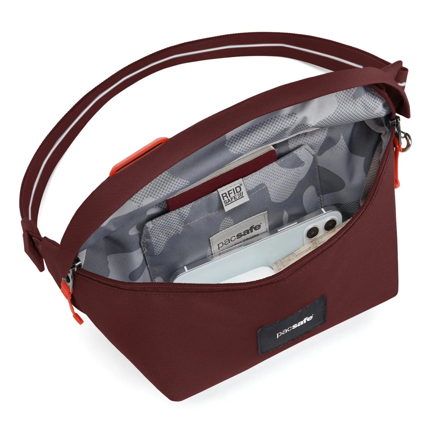 Pacsafe GO Sling Pack, Garnet Red — open main compartment and RFID pocket