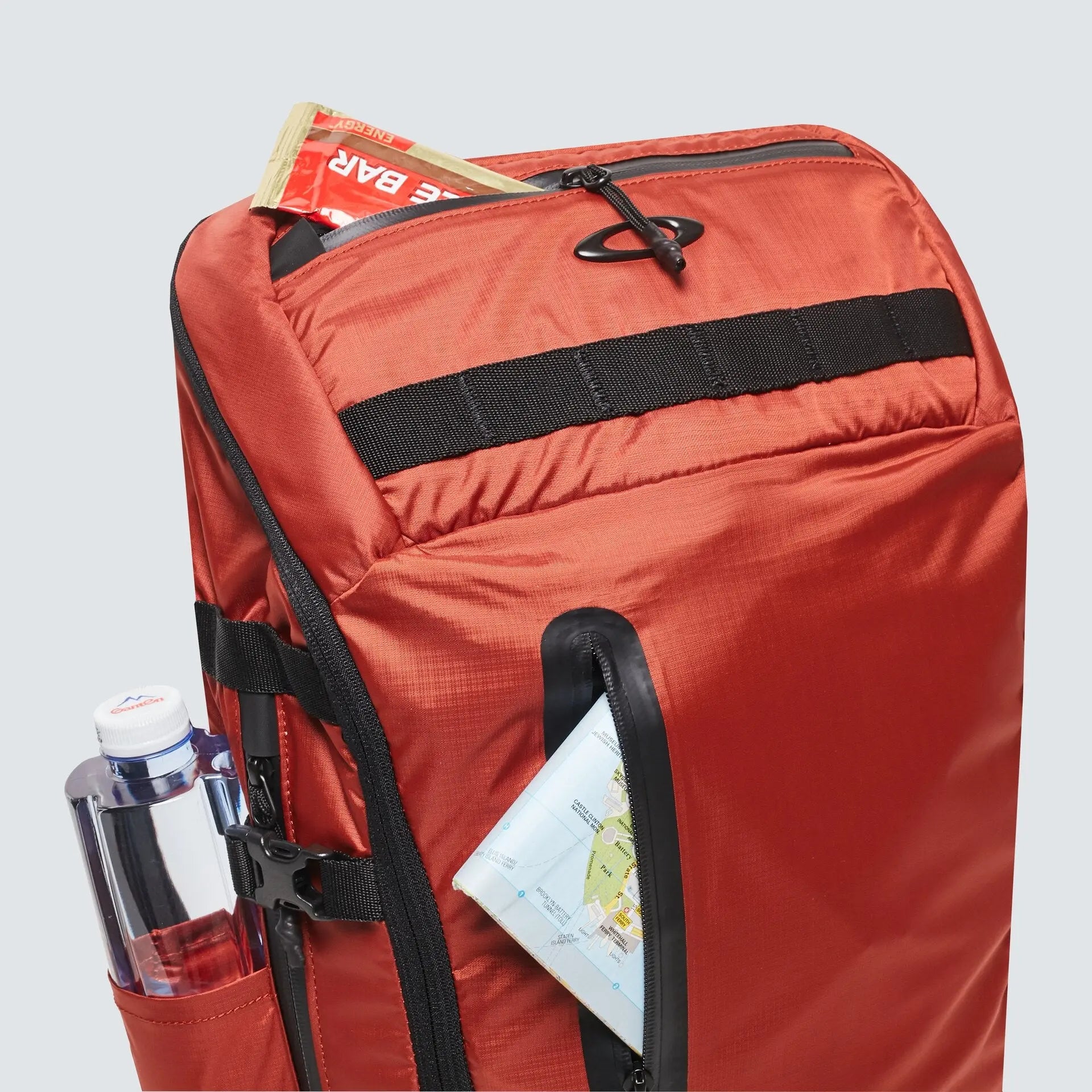 Oakley Outdoor Backpack in Brick - front and side pocket detail