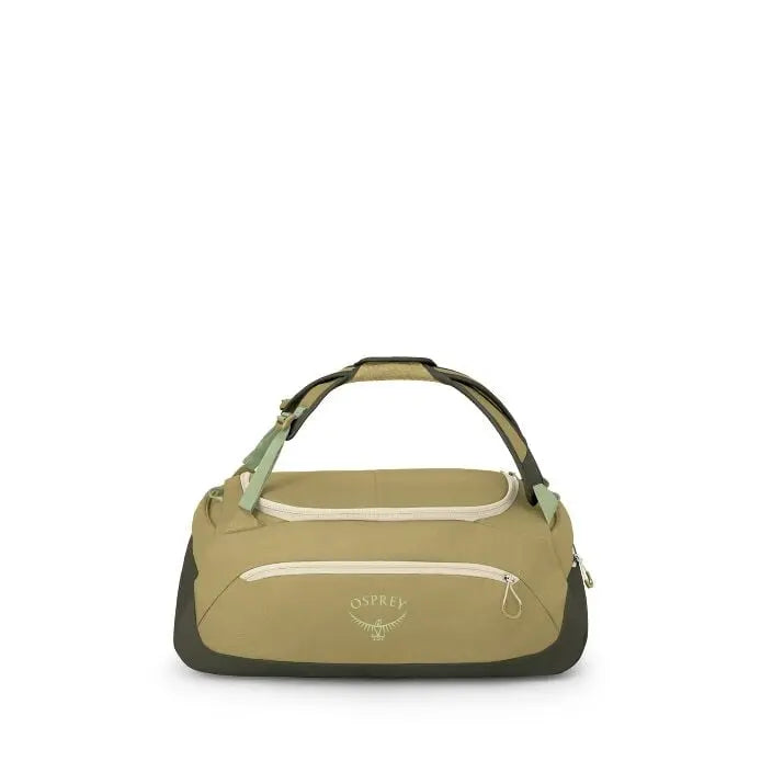 The image shows a compact Osprey duffel bag in shades of olive and green with cream zippers and accents. It has a padded, wraparound handle on top, a front zip pocket with the Osprey logo, and reinforced darker panels on the sides and base. Additional ima