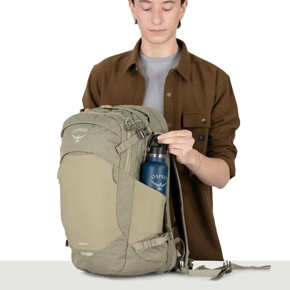Osprey Nebula Driftshade side bottle pocket demonstrated in Olive Tan; shared feature