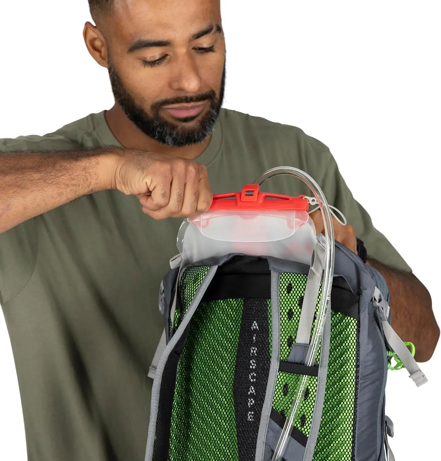 Sportlite 25 external hydration sleeve demonstrated in Dark Charcoal Grey; reservoir sold separately