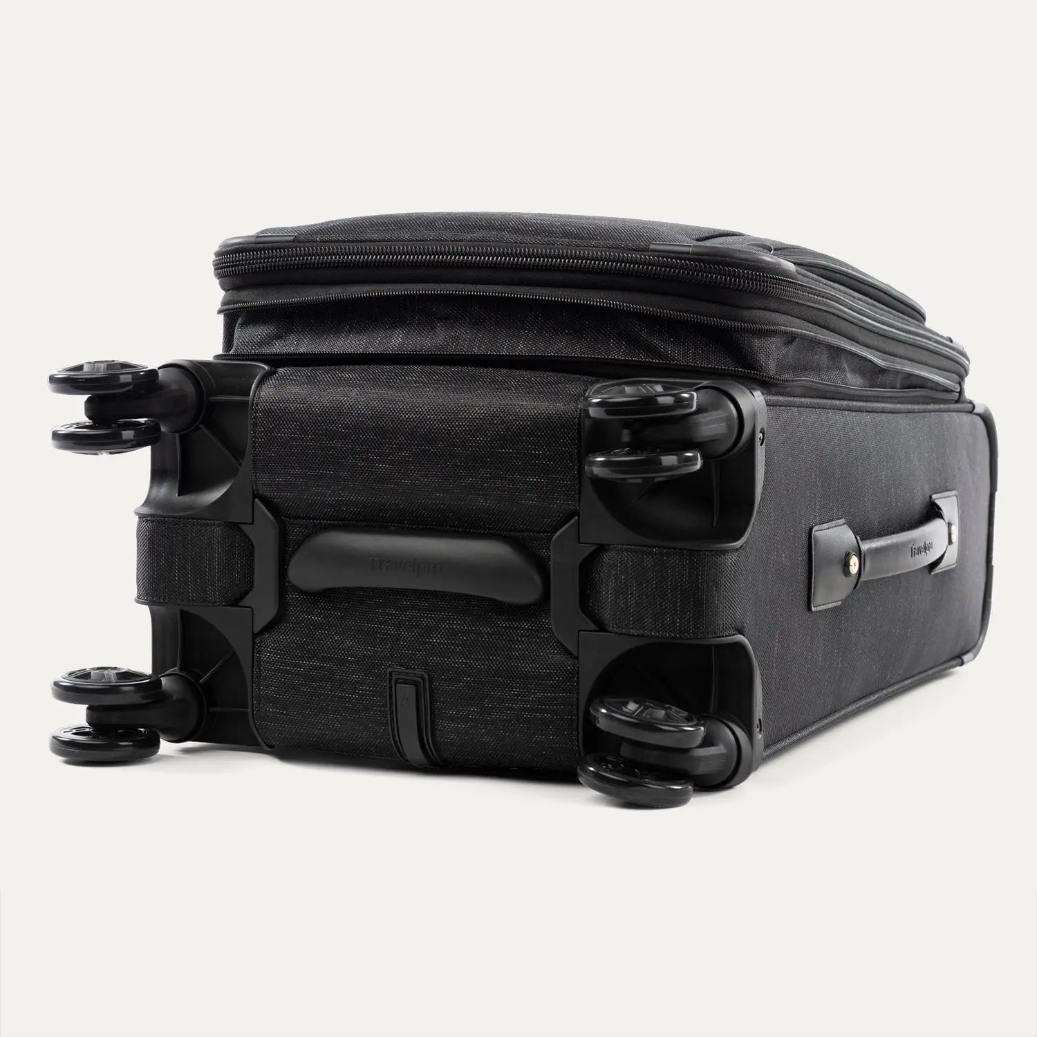 Travelpro Platinum Elite Carry-On Spinner in Intrigue Black - wheels and base