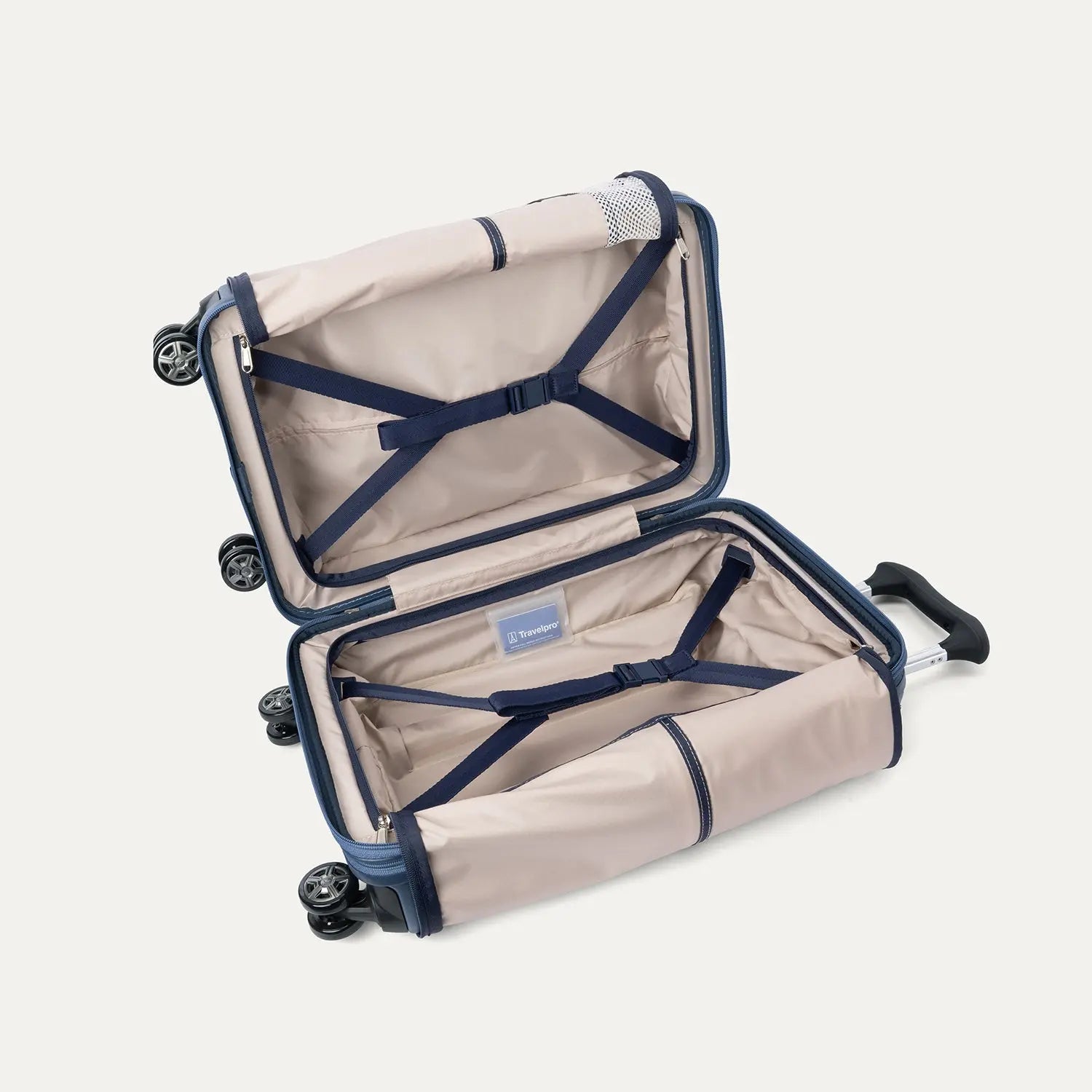 interior view of the travelpro platinum elite compact carry-on hardside spinner in dark sky blue, showing the organized compartment with adjustable tie-down straps and the signature ecofab™ lining.