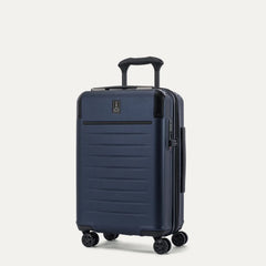 three-quarter front view of the travelpro platinum elite compact carry-on hardside spinner in aviator navy, highlighting the textured polycarbonate shell, integrated tsa lock, and smooth-gliding spinner wheels.
