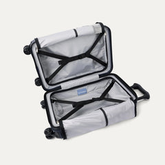 interior view of the open travelpro platinum elite compact carry-on hardside spinner in aviator navy, showing the organized compartment with adjustable hold-down straps and the signature ecofab™ lining.