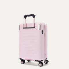 Rear-three-quarters view of the light pink Travelpro Platinum Elite Next Gen Powder Pink Suitcase, showing the hardshell spinner with an extended telescopic handle, top carry handle, TSA combination lock, and multi-directional spinner wheels against a clean off-white background.