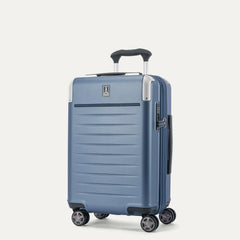 Three-quarter angled view of the Travelpro Platinum Elite Carry-On Hardside Spinner in Dark Sky Blue, showing the telescoping PowerScope Lite handle, integrated TSA lock, and dual spinner wheels.