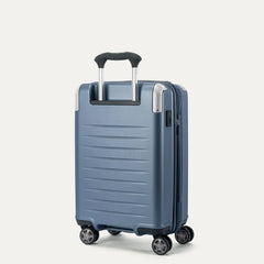 Rear angled view of the Travelpro Platinum Elite Carry-On Hardside Spinner in Dark Sky Blue, showing the durable polycarbonate shell, the PowerScope Lite telescoping handle, and the dual spinner wheels.