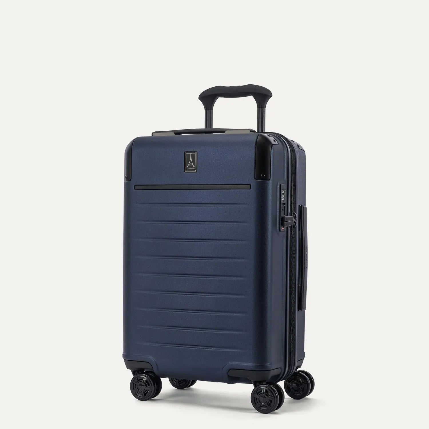 Three-quarter angled view of the Travelpro Platinum Elite Carry-On Hardside Spinner in Aviator Navy, showing the telescoping PowerScope Lite handle, integrated TSA lock, and dual spinner wheels.