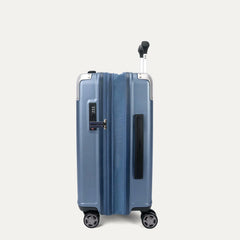 Side profile view of the Travelpro Platinum Elite Carry-On Hardside Spinner in Dark Sky Blue, showing the zippered expansion gusset that provides an additional 2 inches of packing capacity.