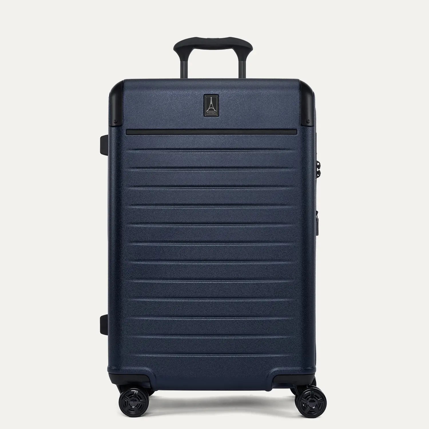 Travelpro Platinum Elite Medium Check-In Hardside Spinner in Aviator Navy, showing the adjustable PowerScope Lite handle, integrated TSA lock, and smooth-rolling dual spinner wheels.