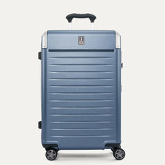 Front view of the Travelpro Platinum Elite Medium Check-In Hardside Spinner in Dark Sky Blue, featuring a durable polycarbonate shell, polished aluminum corner armor, and genuine leather trim.