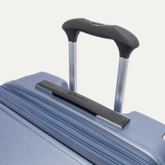 Close-up of the Travelpro Platinum Elite Medium Check-In Hardside Spinner in Dark Sky Blue, featuring the multi-stop PowerScope Lite handle and the sleek, low-profile top carry handle with the Travelpro logo.