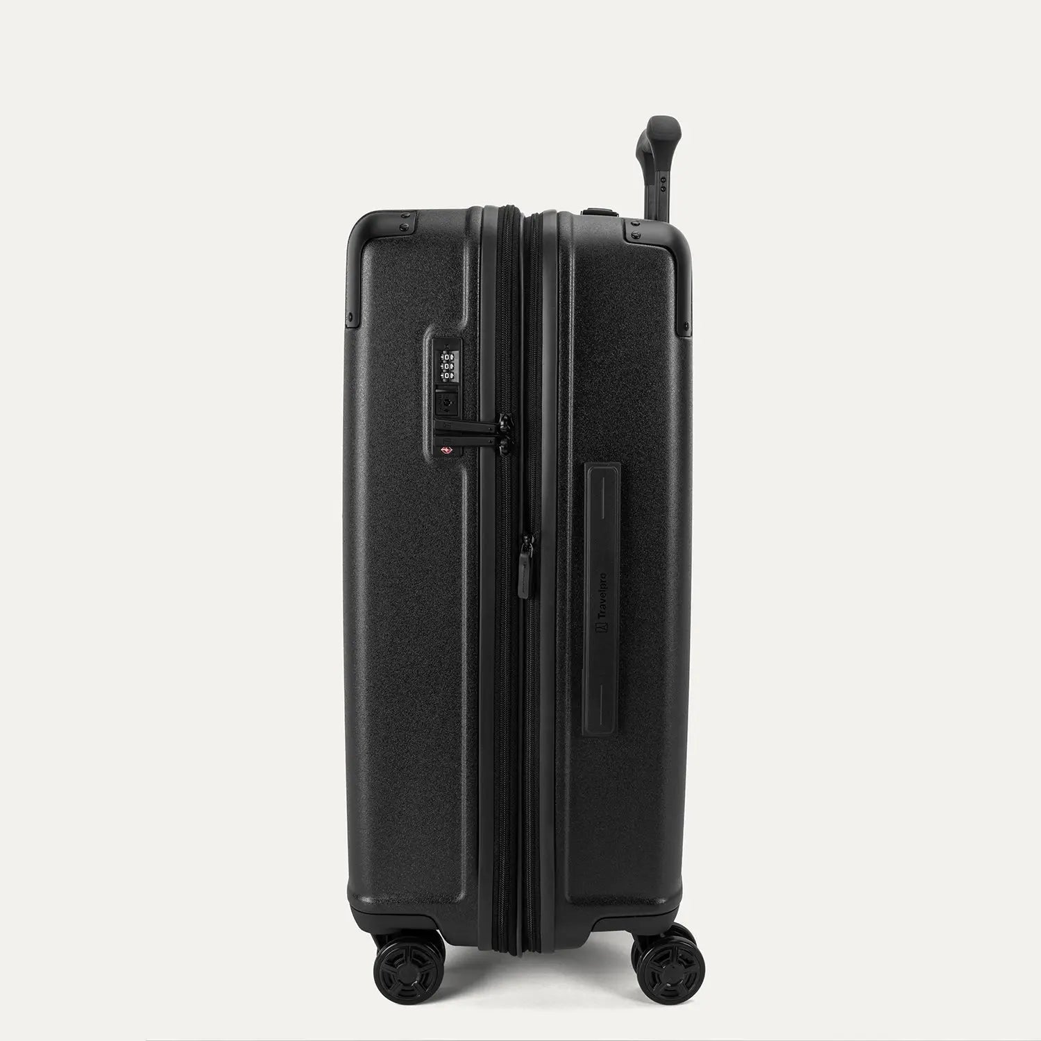 Side profile view of the Travelpro Platinum Elite Medium Check-In Hardside Spinner in Jet Black, showing the integrated TSA-approved lock, side carry handle, and dual spinner wheels.