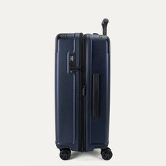 Side profile view of the Travelpro Platinum Elite Medium Check-In Hardside Spinner in Aviator Navy, showing the integrated TSA-approved lock, side carry handle, and the slim profile of the durable polycarbonate shell.