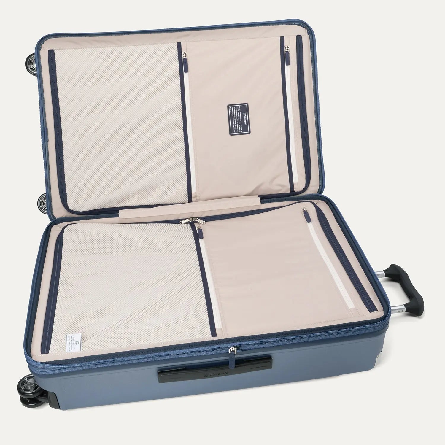 Interior view of the Travelpro Platinum Elite Large Check-In Hardside Spinner in Dark Sky Blue, featuring dual zippered divider panels and the ECOFAB™ lining made from recycled plastic bottles.