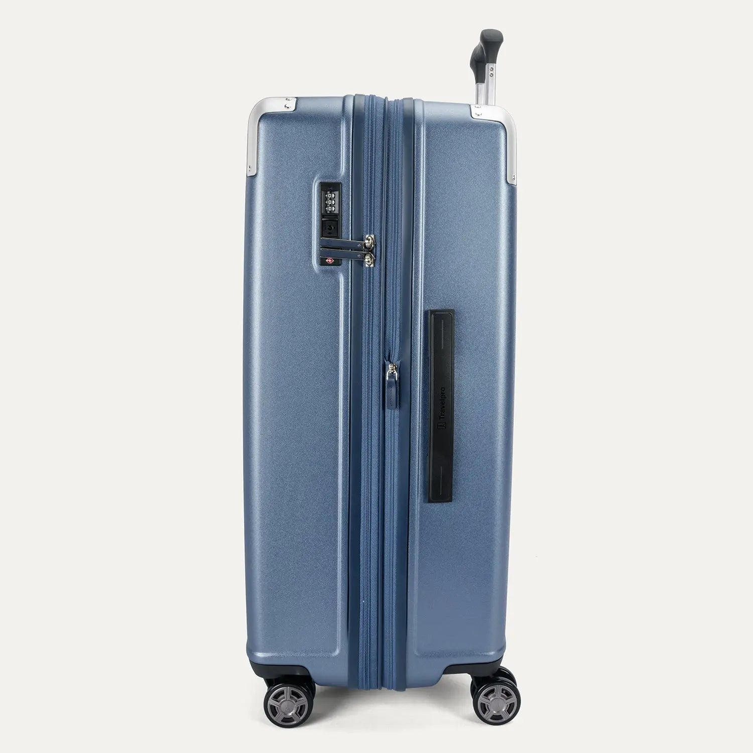 Side profile view of the Travelpro Platinum Elite Large Check-In Hardside Spinner in Dark Sky Blue, showing the expansion zipper, integrated TSA-approved lock, and side carry handle.