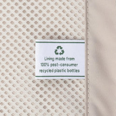Close-up of the interior lining of the Travelpro Platinum Elite Large Check-In Hardside Spinner, featuring a tag stating Lining made from 100% post-consumer recycled plastic bottles for the ECOFAB system.
