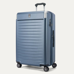 Front 3/4 view of the Travelpro Platinum Elite Large Check-In Hardside Spinner in Dark Sky Blue, featuring a high-impact polycarbonate shell, aluminum corner armor, and 360-degree spinner wheels.
