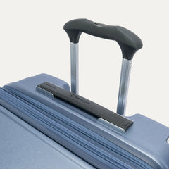 Close-up of the Travelpro Platinum Elite Large Check-In Hardside Spinner in Dark Sky Blue, featuring the multi-stop PowerScope Lite handle and ergonomic rubberized Contour Grip for comfortable handling.